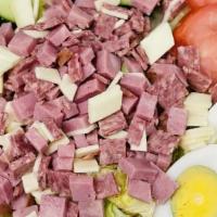 Antipasto Salad · Crisp lettuce with hard Salami, Swiss cheese, Ham, Tomato, Cucumber, and a hardboiled egg.