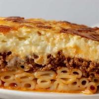 Pastitsio · Made with layers of macaroni, ground beef, eggs, milk and seasonings. Served with rice toppe...