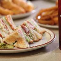Club Sandwich · Classic triple-decker with turkey, bacon, lettuce, tomato and mayonnaise on toasted white.