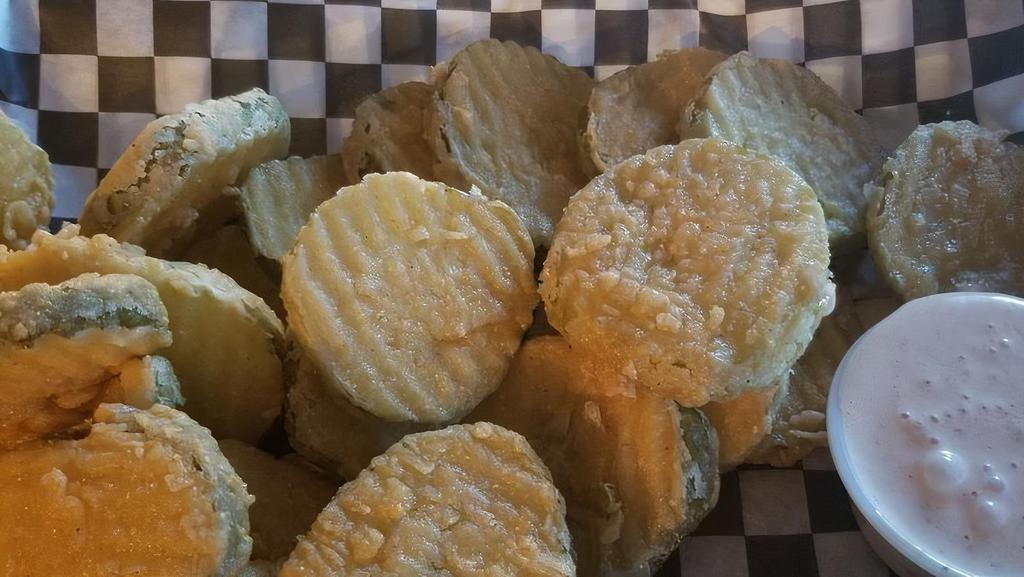 Frickles · Hand breaded dill pickle chips, deep fried and served with sriracha ranch.