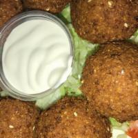 Falafel Platter 8 Pieces/ Full Meal · Ground chickpeas mixed with Garnishes and our special spices deep fried, lettuce, tomatoes, ...