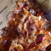 Porteño · San marzano, cheese blend, smoked mozzarella, pickled peppers, pancetta, red onions.