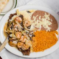 Steak & Shrimp · Your choice of a juicy steak and shrimp grilled with onions and mushrooms, topped with chees...