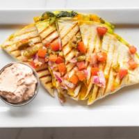 Chicken Quesadilla · Flour tortilla stuffed with roasted chicken, cilantro-pumpkinseed pesto, onions, peppers, ch...