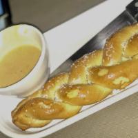 Pretzel & Beer Cheese Fondue · Vegetarian. Creamy blend of cheddar cheese, smoked onions, spices and chatterbox speakeasy l...