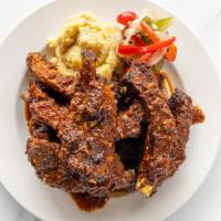 Tender Back Ribs · Gluten-free. Four tender, fall off the bone pork ribs that were dry rubbed with chatterbox's...