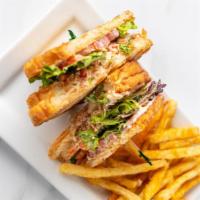 The Lobster Grilled Cheese Club · Poached lobster salad, black truffle mayo, mixed greens, fresh tomato on top with melted pro...