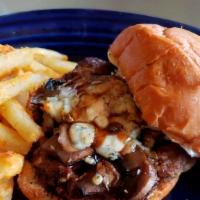 Wild Bleu Yonder Burger · Topped with roasted mushrooms, melted bleu cheese, black truffle mayo and cabernet-balsamic ...