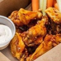 Jumbo Chicken Wings · Traditional wings tossed in your choice of sauce, served with choice of dipping sauce, celer...