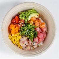 Signature Bowl · Favorite. Raw. White rice, poké sauce, salmon, tuna, yellowtail sweet corn, tomatoes, seawee...