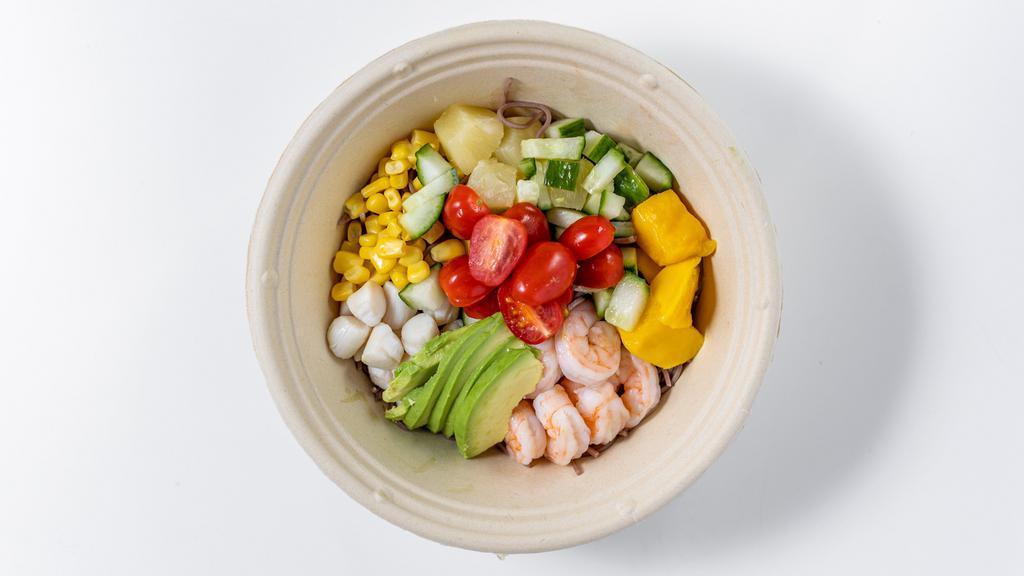 Tropical Bowl · Soba noodles, sweet mango, shrimp, scallops, cucumber, sweet corn, tomatoes, diced mango, pineapple, avocado.