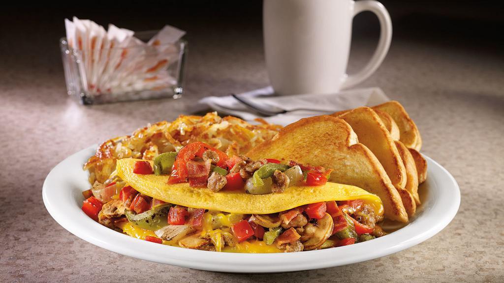 Ultimate Omelette®. · Sausage, bacon, fire-roasted bell peppers & onions, mushrooms, tomatoes and Cheddar cheese. Served with hash browns and choice of bread.
