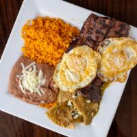 Chilaquiles · 2 pieces of eggs made your way, with fried tortilla strips topped with green or red salsa, q...