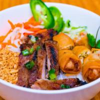 Bún Thịt Nướng Chả Giò · Rice vermicelli with grilled marinated pork and an egg roll.