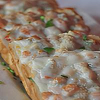Bruschetta Fresca · Toasted bread covered with diced tomatoes, garlic, basil and melted mozzarella cheese.