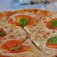 Pizza Doppia · Home-made thin pizza crust topped with your choice of meat-sauce or margherita style.