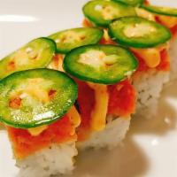 Michigan Roll · Raw. Rolled with shrimp tempura, avocado and wrapped with spicy tuna and jalapenos and spicy...