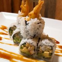 Philly Cheese Roll · Crab, avocado, cucumber, shrimp tempura, cream cheese with eel sauce on top.