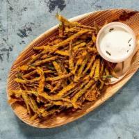 Crispy Okra Fries · VEGETARIAN and GLUTEN FREE. . Fresh cut and flash-fried, dry seasoned, and served with PK Ra...