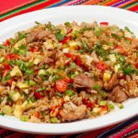 Arroz Chaufa (1 Meat) · Peruvian style stir-fried rice with your choice of beef, pork and/or chicken.