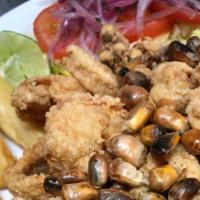 Jalea Mixta · Crispy seasonal fish, squid, shrimps, calamari.  Served with yuca, salsa criolla and tartar ...