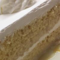 Tres Leches · Cake that is soaked in 3 kinds of milk sweetened condensed milk evaporated milk and heavy cr...