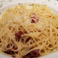 Spaghetti Carbonara · Prosciutto, Spinach, Onions & Parmesan Cream