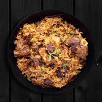 Mighty Mutton Biryani · Long grained rice flavored with fragrant spices flavored along with saffron and layered with...