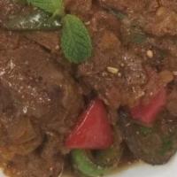 Lamb Korma · Korma Gravy Mixed of Cashews, raisin , yoghurt and Blend of spices Cooked with Lamb Stews.