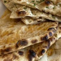 Aloo Naan · Naan Bread Mixed with Flavored Potatoes and the  Cooked in the Tandoor Oven.
