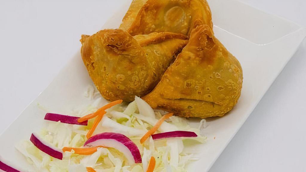 Vegetable Samosa · Potatoes and Green Peas Cooked with Blend of spices then Fried with Pastry Flakes
