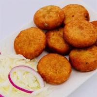 Potato Chops · Mashed Potatoes with blend of spices then fried with House Battered.