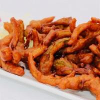 Onion Pakora · Onion Deep Fried with blend of spices with Battered sauce.
