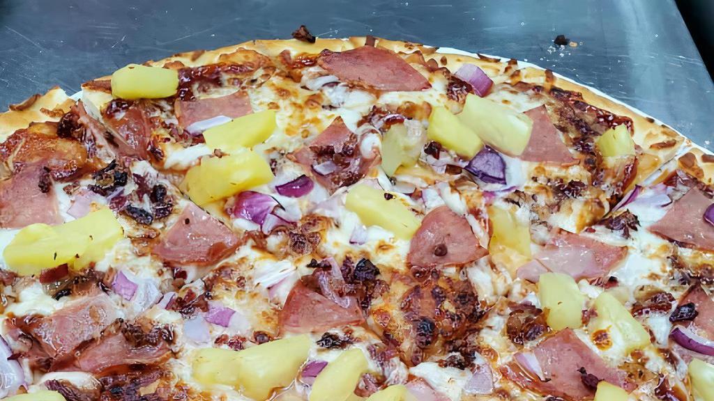 Hawaiian Bbq Pizza · Ham, Bacon, Pineapple, Red Onions, Made with House BBQ Sauce.