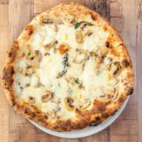 Pizza Al Tartufo · Truffle cream sauce, mozzarella, mushroom, basil & parmesan cheese.