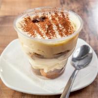 Tiramisu · Homemade ladyfingers dipped in coffee, covered in mascarpone cheese & topped with cocoa powd...