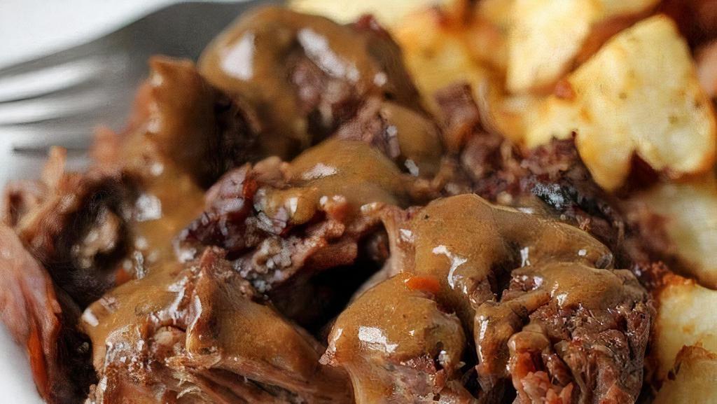 Pot Roast · Italian beef sliced into strips, topped with a yum gravy, it's tender, juicy, and it goes superbly with your choice of any 2 sides!