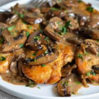 Chicken Marsala · Lightly floured chicken breasts topped with savory mushroom and marsala wine sauce, gently t...