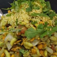 Bhel Puri · Puffed rice and sev mixed with potatoes, onions, chutneys and spices