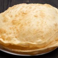 Chole Bhature · Masala chickpeas with 2 bhatura (Fried Bread) served with halwa, pickle, sweet yogurt, and o...