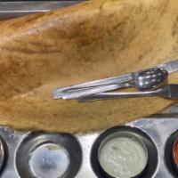 Masala Dosa · Rice and lentil crepe filled with spiced potatoes and onions
