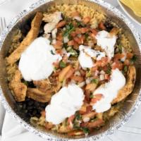 Tequila Bowl · A bowl filled with rice, black beans, your choice of grill chicken or steak, topped with pic...