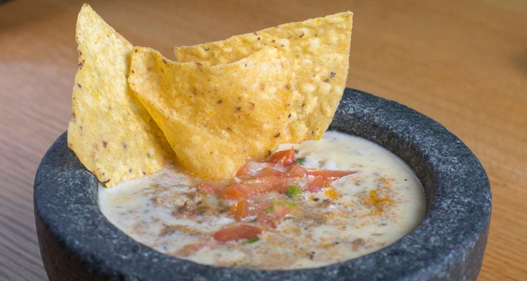 Salsa Verde’S Own Dip With Chips · Our original cheese dip along with seasoned ground beef and fresh pico de gallo.