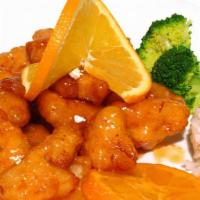 Sweet & Spicy Chicken · Mandarin style chicken breaded, fried and seasoned with sweet and spicy sauce, served with s...