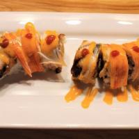 Vampire Roll · Hot. Tempura shrimp, crunch chips topped with crabmeat and eel.