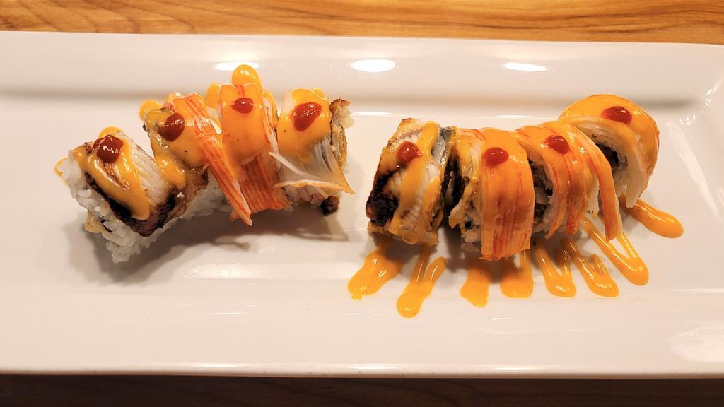 Vampire Roll · Hot. Tempura shrimp, crunch chips topped with crabmeat and eel.