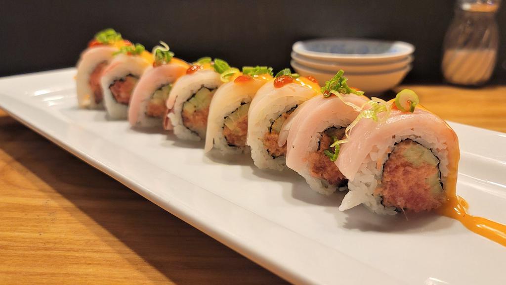 Ladybug Roll · Hot. Cucumber, spicy tuna, topped red snapper, yellowtail, scallions.