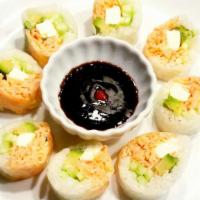 Naked Spicy Roll · Hot. Spicy crabmeat, cream cheese, avocado, cucumber, rice paper.