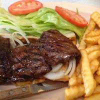 Skirt Steak Sandwich · Skirt steak marinated in a special blend served with lettuce, tomato and onion. Served on Fr...