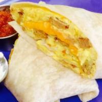 Breakfast Burrito Wrap · Eggs, sausage or ham, cheddar cheese and hash browns wrapped in flour tortillas.